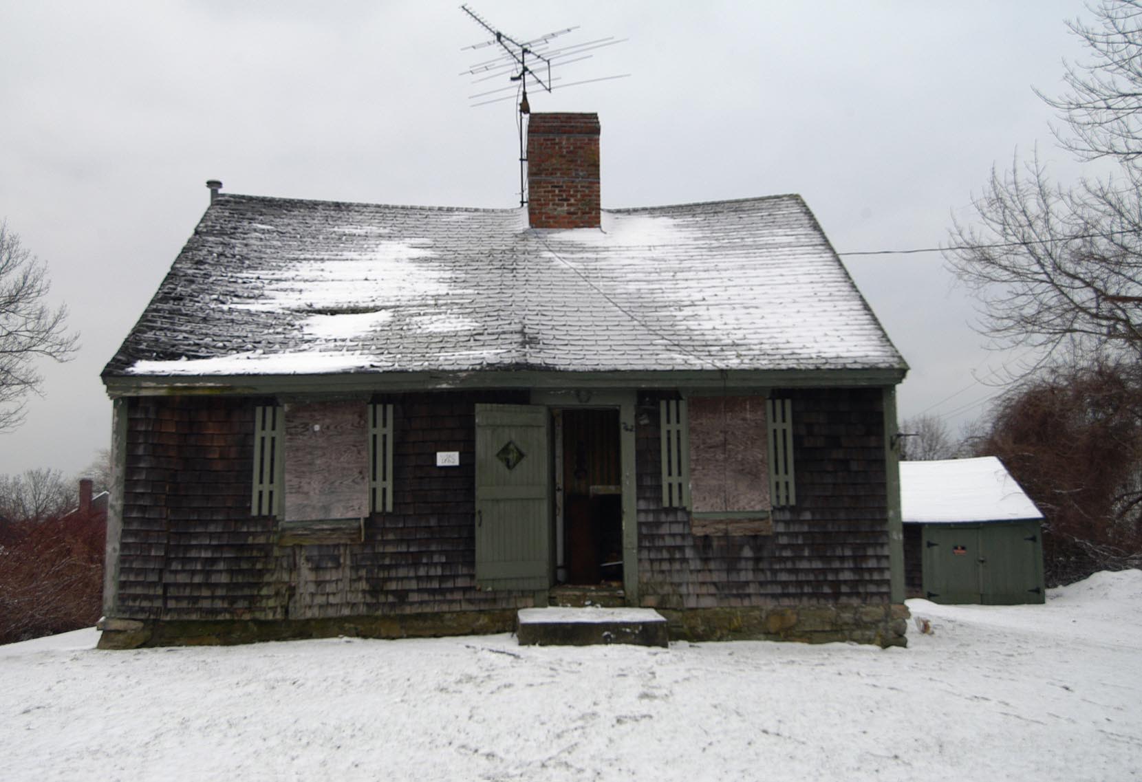 Front of Akin House before restoration.