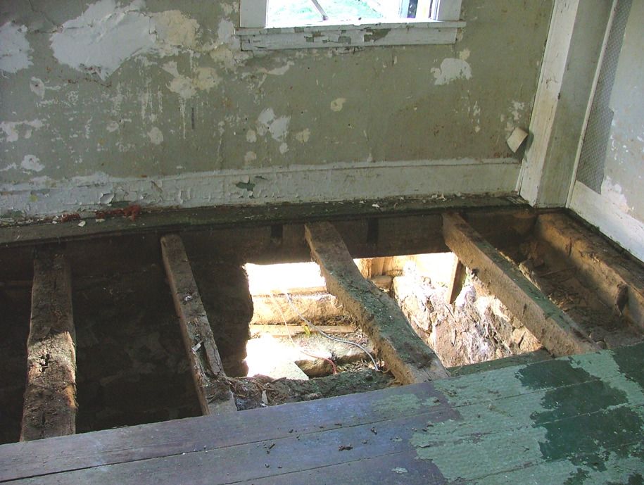 D Room of Akin House showing back wall and empty joists pockets. Photograph taken November 1, 2005.