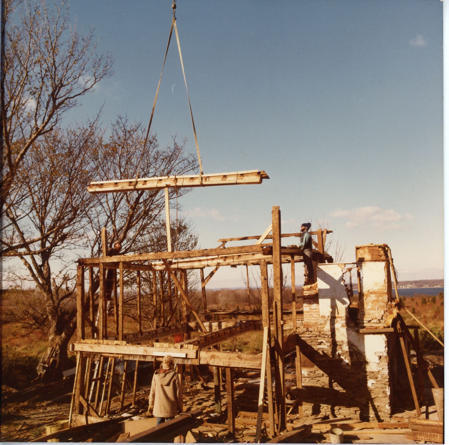 Mott House dismantling, 2nd Floor, Room L. East summer beam lifted.